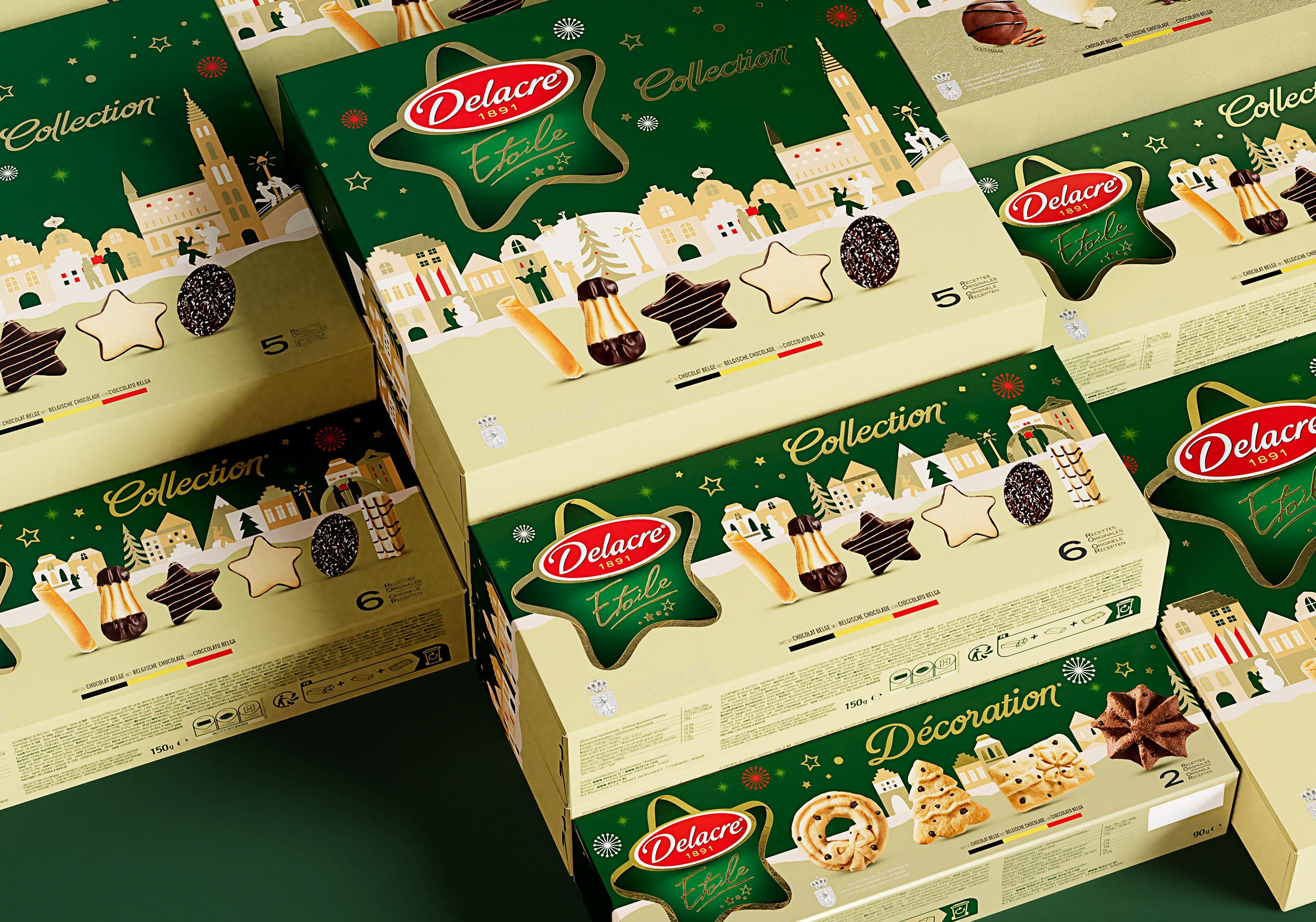 Pile di scatole Delacre Étoile Collection e Decoration con grafiche natalizie e biscotti misti visibili sulle confezioni