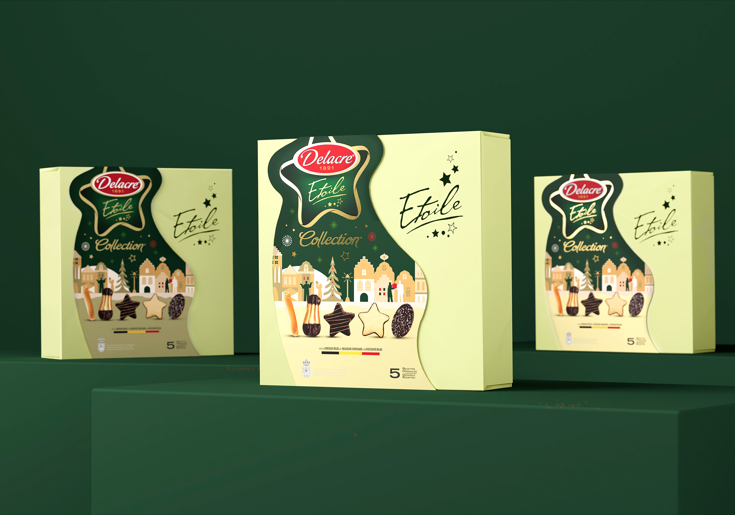 Tre scatole Delacre Étoile Collection esposte su piedistalli, con design sagomato a forma di stella e biscotti illustrati sul fronte