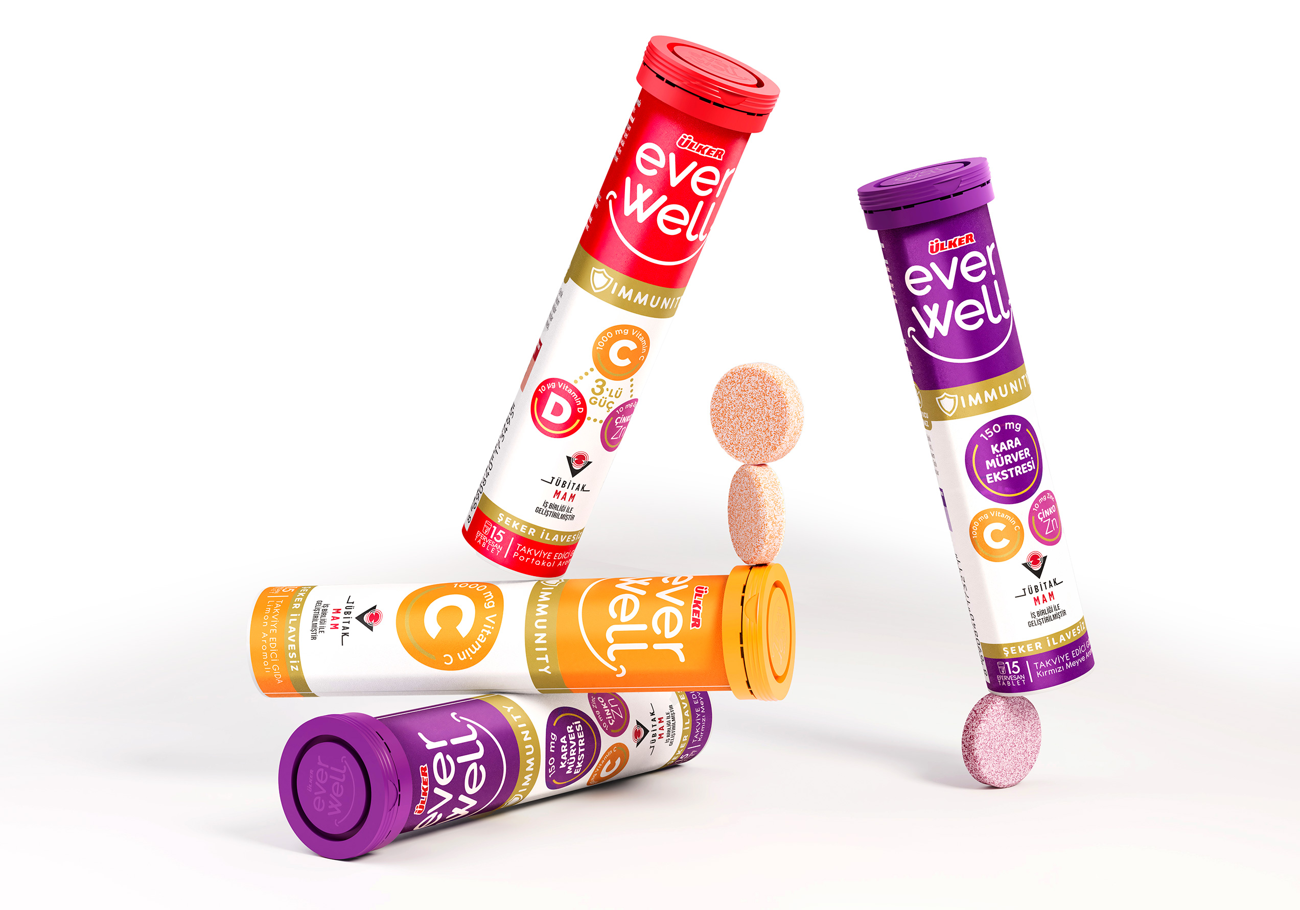 Composizione di flaconi e compresse effervescenti Ülker Everwell in equilibrio su fondo bianco