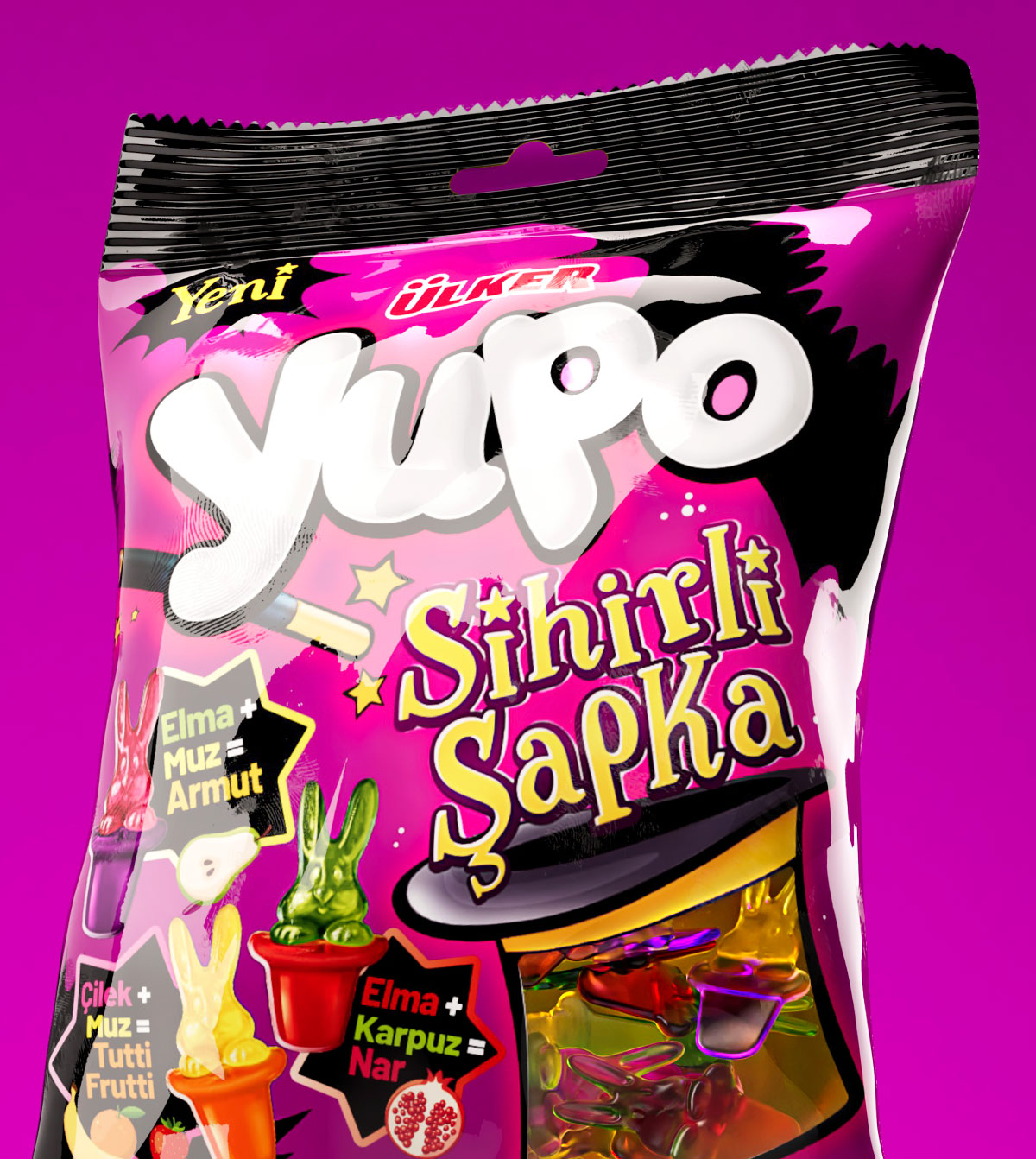 Primo piano del pack Yupo Sihirli Şapka con sfondo fucsia brillante, raffigurante le caramelle a forma di coniglietto che escono dal cilindro magico